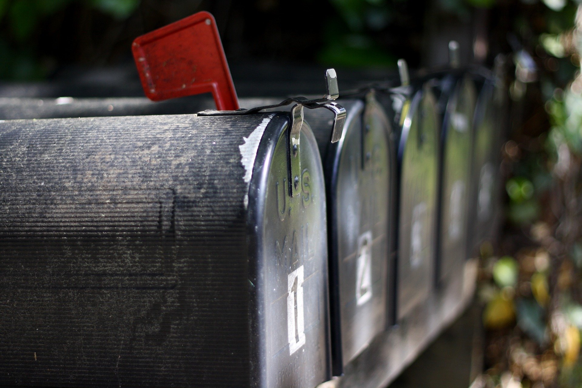Picture depicting a row of american style mailbox